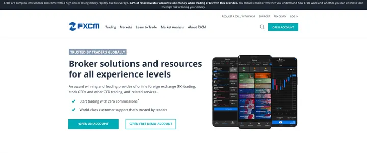FXCM homepage headline 'Broker solutions and resources for all experience levels' under a 'Trusted by traders globally' banner
